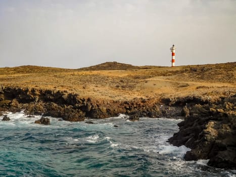 Light House along the Shore with cliffs In Tenerife Spain