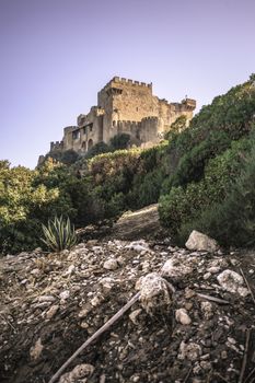 View of the Falconara castle in Sicily during sunset. Vertical Shot.