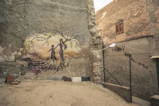 Wall painting that indicates a meeting of souls in an old palace in Licata in Sicily