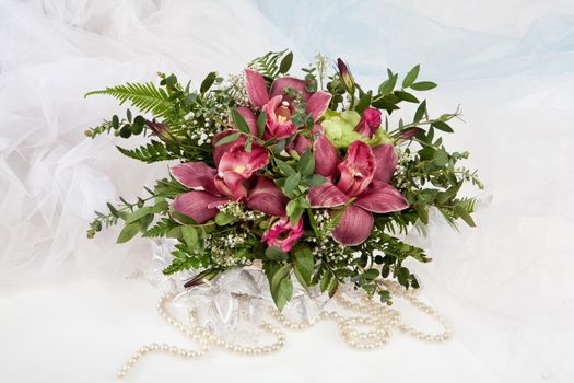 Still life with flowers on a studio background