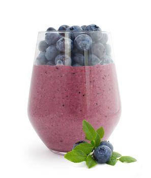 Smoothie and fresh berries blueberries studio isolated on white background
