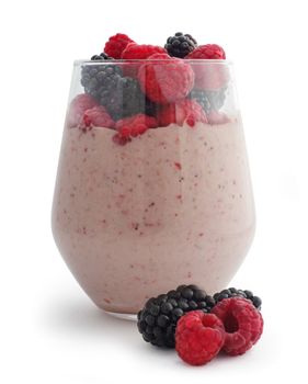 Smoothie and fresh berries raspberry and blackberry studio isolated on white background