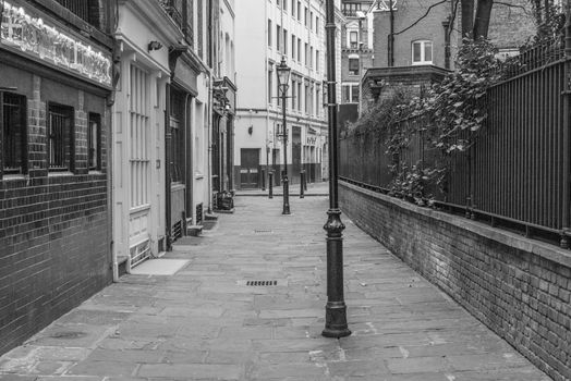 Empty, classical London street with street lamp without people