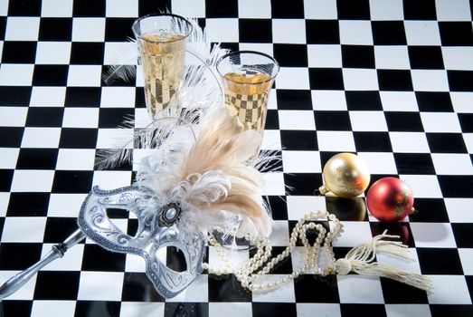 Decorative elements on a checkered studio background