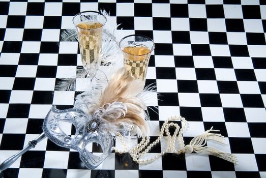 Decorative elements on a checkered studio background