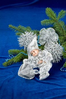 New year's tree and little toy on a fabric