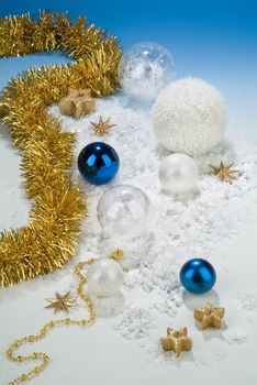 Christmas still life with toys and balls on a studio background