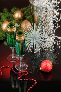 Glasses with wine on a decorative fabric background