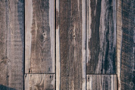 Background of old wooden textured floor in sunlight.