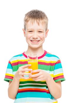 happy boy with a glass of fresh orange juice on a white background