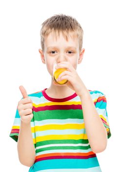 baby drinking juice from oranges on a white background