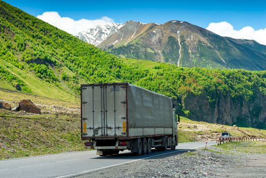 Laden wagon in the mountains on the Georgian Military Road