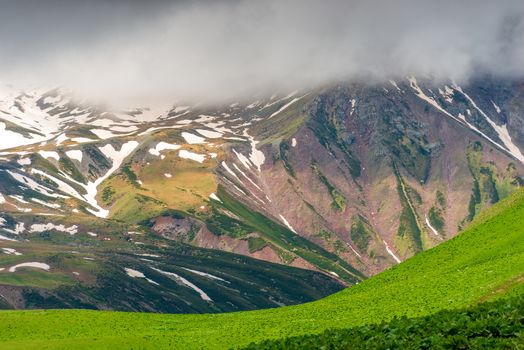 Mountains and clouds, beautiful picturesque landscape of Georgia, a trip along the Georgian Military Road