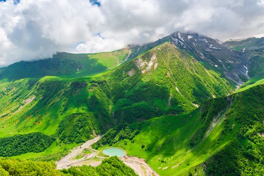 Summer landscape of the Caucasus Mountains, view of the gorge, Georgia in June