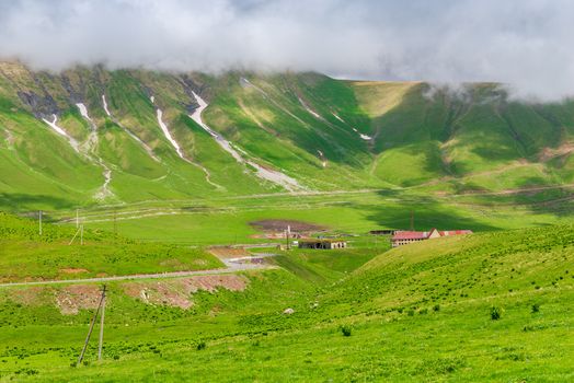 Scenic green mountains and clouds, Caucasus in June, Georgia trip