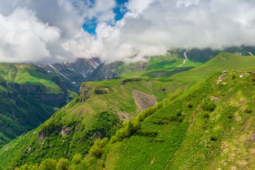 green surface of the high picturesque Caucasus Mountains, Georgia