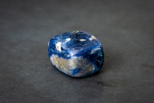 Sodalite gemstone different tones of blue white and black