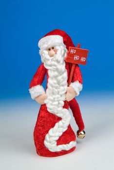 Santa Klaus statuette on a studio background