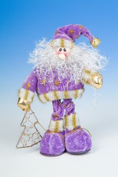 Santa Klaus statuette on a studio background