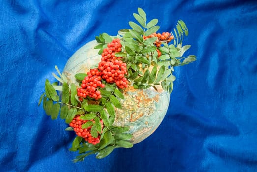 Still life with bouquet of flowers and accessories on a studio background