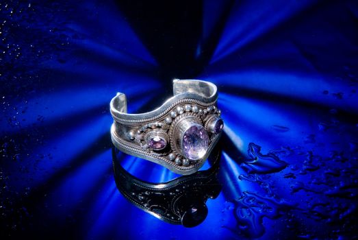 Jewelry on a glass studio background