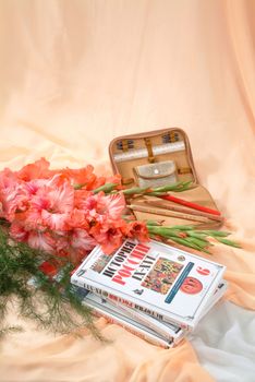 School books and accessories on a studio background