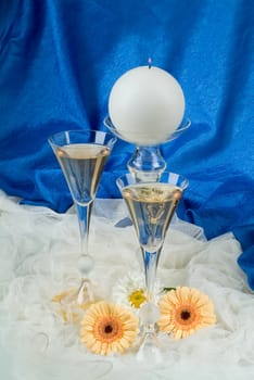 Still life with bouquet of flowers and accessories on a studio background