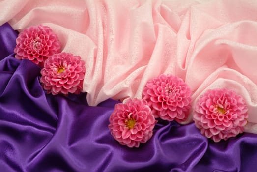 Still life with bouquet of flowers and accessories on a studio background