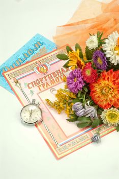 School books and accessories on a studio background