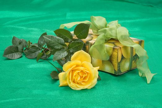 Still life with bouquet of flowers and accessories on a studio background