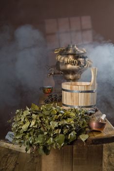 Russian traditional bath accessories on a wooden background