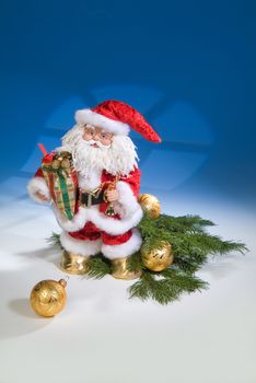 Santa Klaus statuette on a studio background