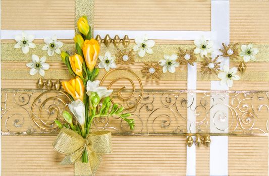 Still life with bouquet of flowers and accessories on a studio background