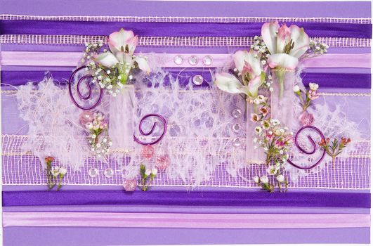 Still life with bouquet of flowers and accessories on a studio background