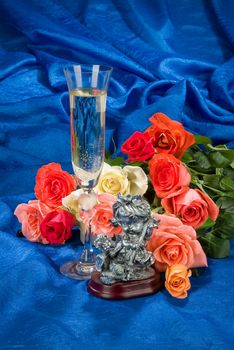 Still life with bouquet of flowers and accessories on a studio background