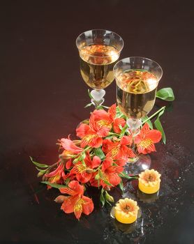 Still life with bouquet of flowers and accessories on a studio background