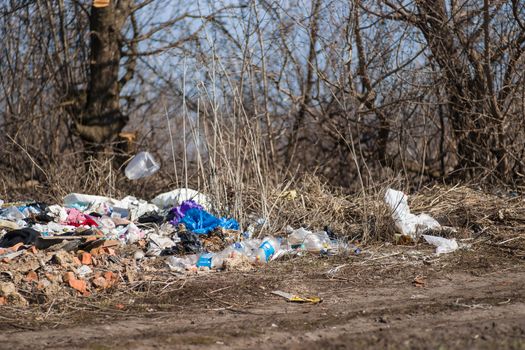 Trash on the agriculture field. Ecology problem and big harm to nature. 