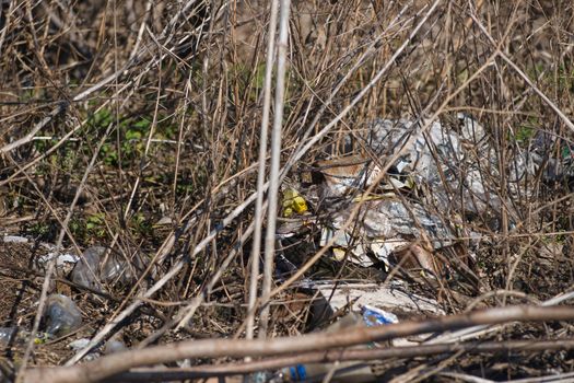 Trash on the agriculture field. Ecology problem and big harm to nature. 