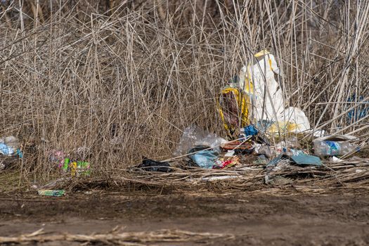 Trash on the agriculture field. Ecology problem and big harm to nature. 