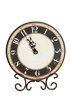 Wall clock in old fashioned style on isolated background