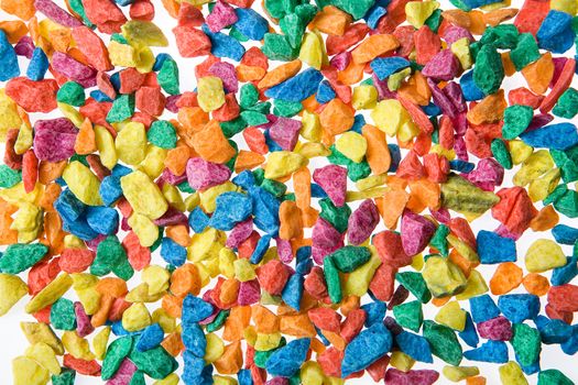 Little coloured stones on isolated background