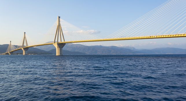 Cable-stayed suspension bridge crossing Corinth Gulf strait, Greece. It is one of the world's longest multi-span cable-stayed bridges and the longest of the fully suspended type