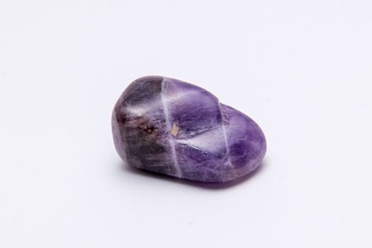 Fluorite precious gemstone with smooth surface purple and grey tones