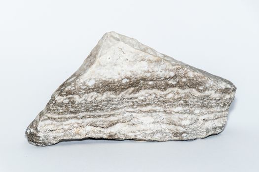 A grey and white anhydrite mineral precious stone