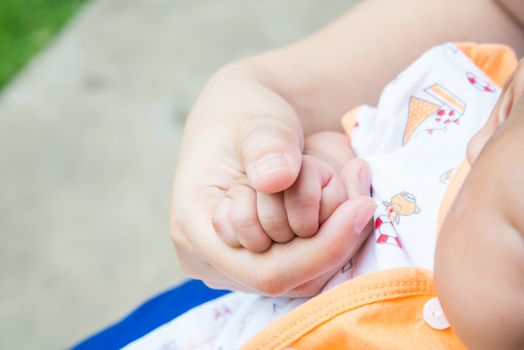 A handful of baby's fingers, concept of love and family,sensitive focus