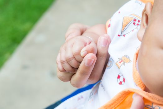 A handful of baby's fingers, concept of love and family,sensitive focus