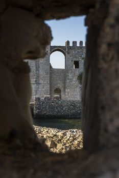 Window view of the Methoni Venetian Fortress in the Peloponnese, Messenia, Greece. The castle of Methoni was built by the Venetians after 1209.