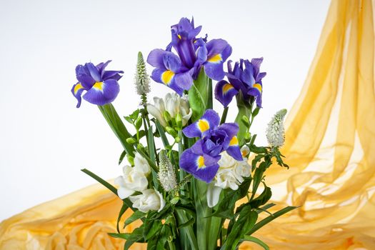 Bouquet of flowers on a fabric background