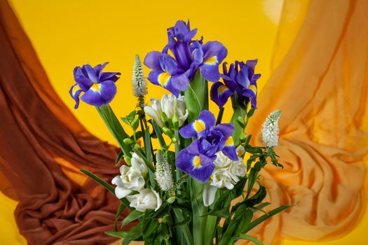 Bouquet of flowers on a fabric background