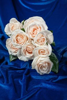 Bouquet of flowers on a fabric background